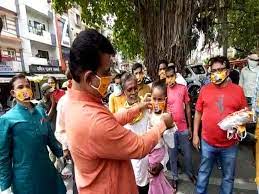 bhopal,MP Shankar Lalwani, distributed masks , Prime Minister , photo 