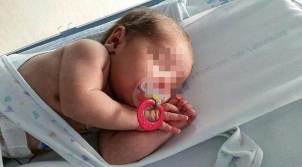 Two day old newborn found among graves