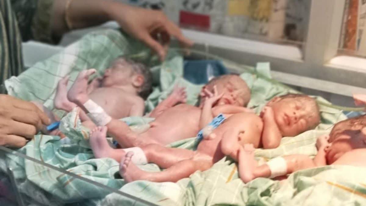 Woman gives birth to four children